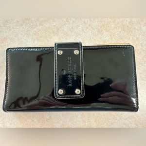 Kate Spade black patent leather wallet with tan interior